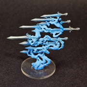 The Used Warhammer Age of Sigmar: Quicksilver Swords Endless Spell is a table-ready miniature with five silver blades emerging from swirling blue shapes on a clear round base, shown against a black background.
