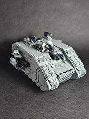 Assembled and partially painter Land Raider Redeemer.
Partially magnetized.
