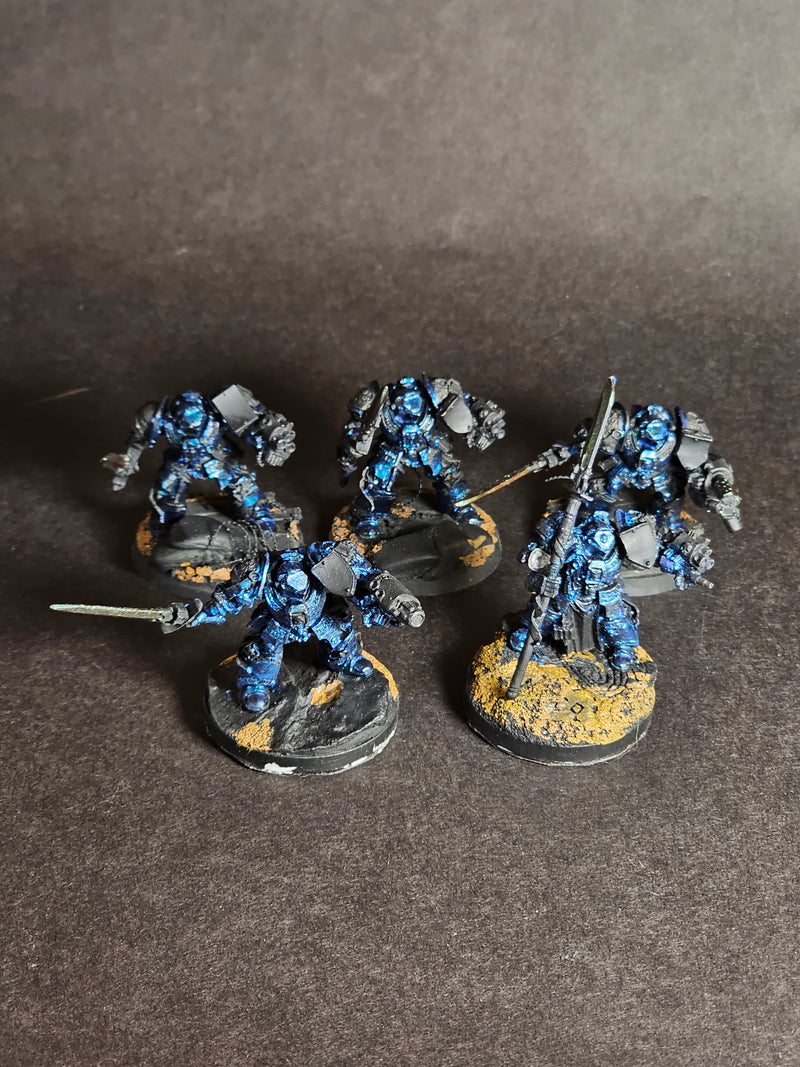 Built and assembled Grey Knight Metal Terminator Squad.

Partially painted and based.