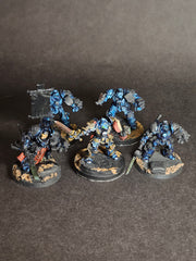 Built and assembled Grey Knight Metal Terminator Squad.

Partially painted and based.