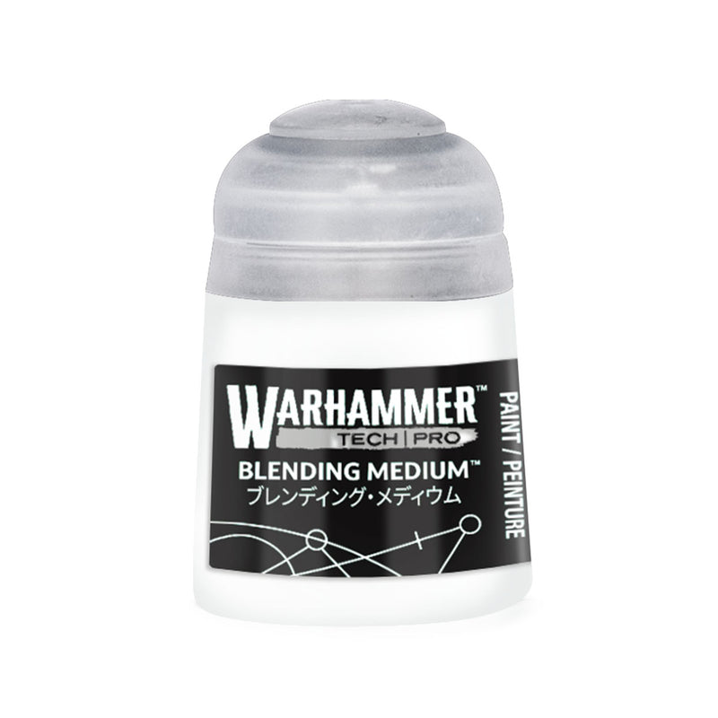 A Warhammer Tone Pro plastic paint pot with a translucent cap and a black label reading Blending Medium in English and Japanese.