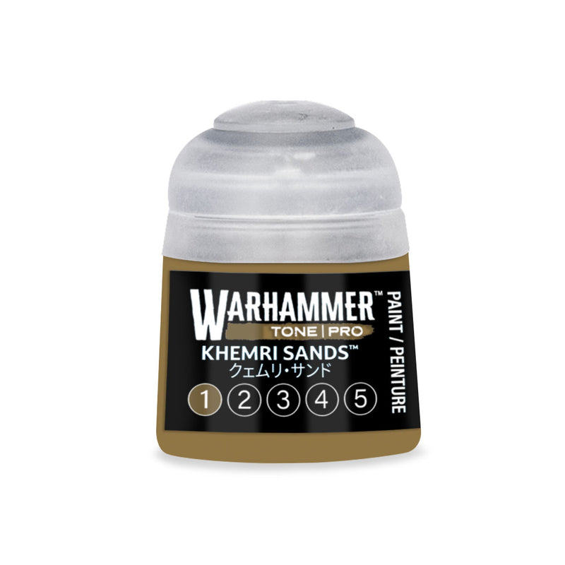 A small Warhammer Tone Pro plastic pot of brown acrylic paint with a translucent cap and a label reading Khemri Sands, featuring a numbered scale from 1 to 5.