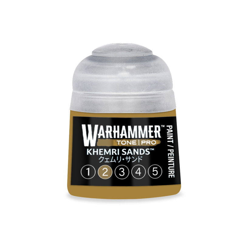 A small Warhammer Tone Pro paint pot labeled Khemri Sands, featuring a numbered scale from one to five at the bottom.