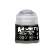 A small Warhammer Tone Pro plastic bottle of Dataslate Grey model paint, featuring a translucent cap and a label marked with the numbers one through five.