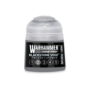 Small pot of grey Warhammer Tone Pro paint with a Blackstone Void label featuring a row of numbers one through five enclosed in circles.