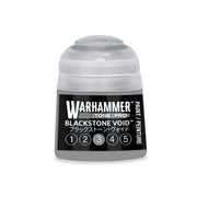 A Warhammer Tone Pro paint pot with a clear cap and a black label featuring the name Blackstone Void and a numbered scale from one to five.