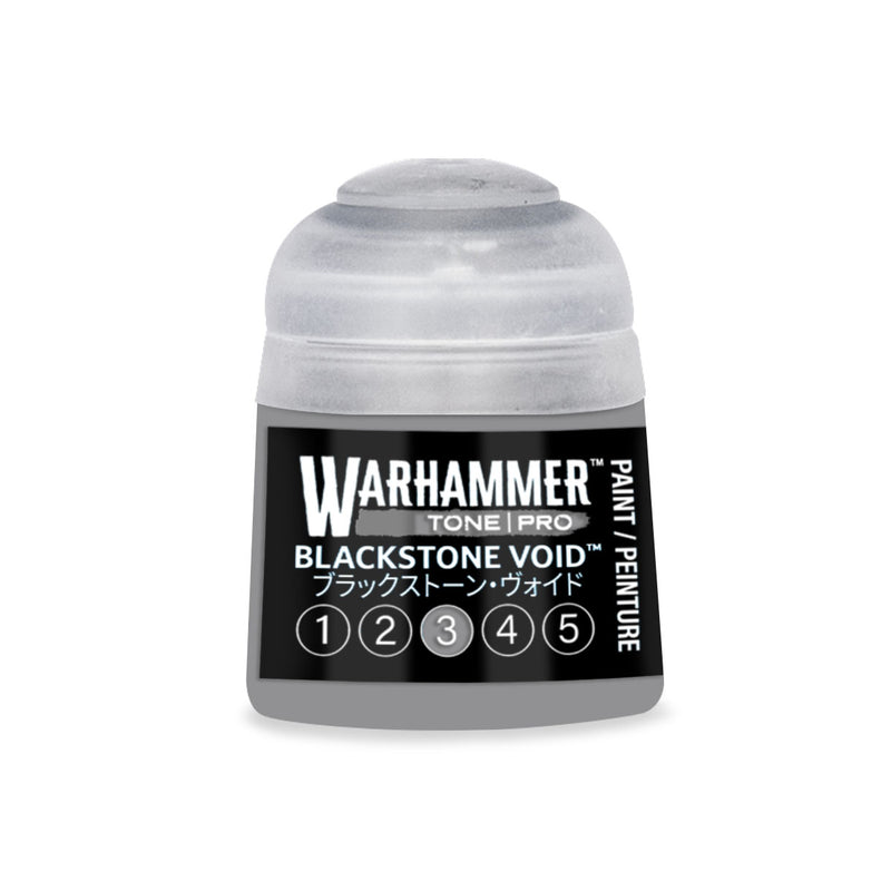 A Warhammer Tone Pro paint pot with a clear cap and a black label featuring the name Blackstone Void and a numbered scale from one to five.