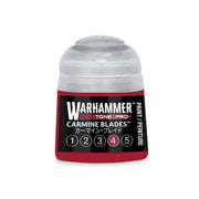 A bottle of Warhammer Tone Pro red paint labeled Carmine Blades, featuring a numbered scale from one to five with the number four highlighted.