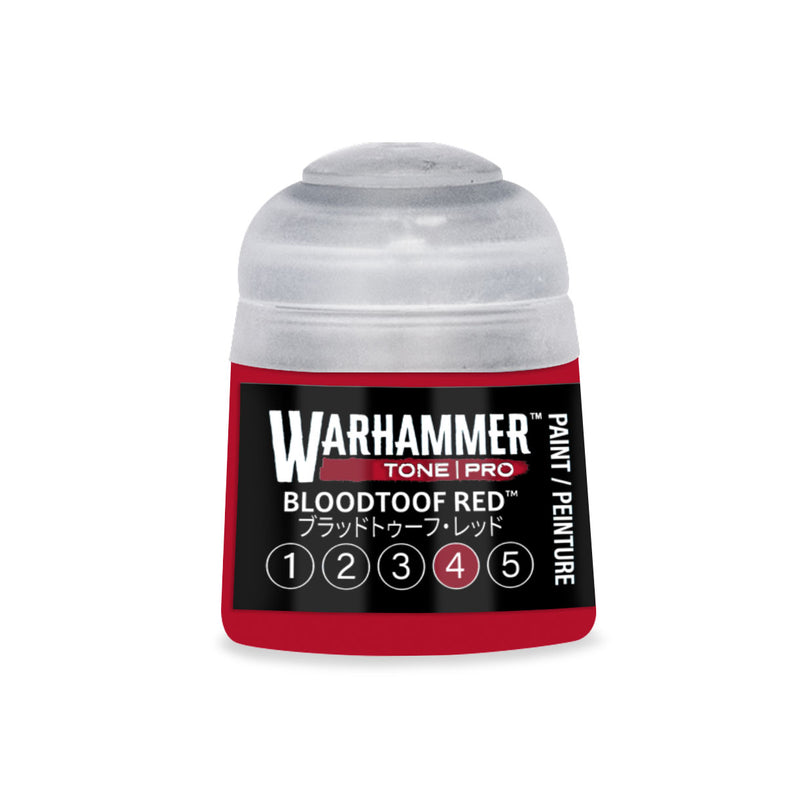 Small plastic Warhammer Tone Pro paint pot with a red label featuring white text and a row of numbered circles from one to five.