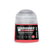 Small plastic pot of Warhammer Tone Pro Bloodtoof Red paint, featuring a label with a numbered scale from one to five with the number five circled.