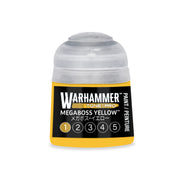 Small yellow Warhammer Tone Pro paint pot with a grey cap and a label reading Megaboss Yellow, featuring a numbered selection scale from one to five.