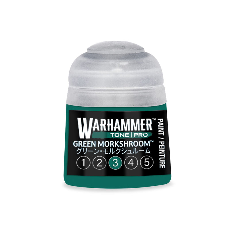 A Warhammer Tone Pro paint pot with a dark green base, a gray cap, and a label reading Green Morkshroom with a scale from 1 to 5 highlighting the number 3.