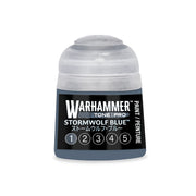 A Warhammer Tone Pro paint pot labeled Stormwolf Blue, featuring a series of five numbered circles at the bottom of the container.