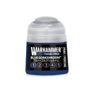 A small Warhammer Tone Pro plastic pot of blue paint with a label featuring the name Blue Gorkshroom and a row of numbers from one to five in circles.
