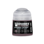 Small bottle of Warhammer Tone Pro dark paint with a black label featuring the name Magnus the Red and a row of numbers from one to five.