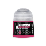 Small pot of Warhammer Tone Pro magenta paint with a black label featuring the product name and a numbered scale from one to five.