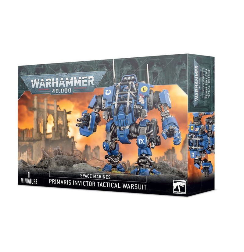 A box of Warhammer 40k: Spacemarines Primaris Invictor Tactical Warsuit, showing a blue armored mech with weapons against a fiery, ruined cityscape.