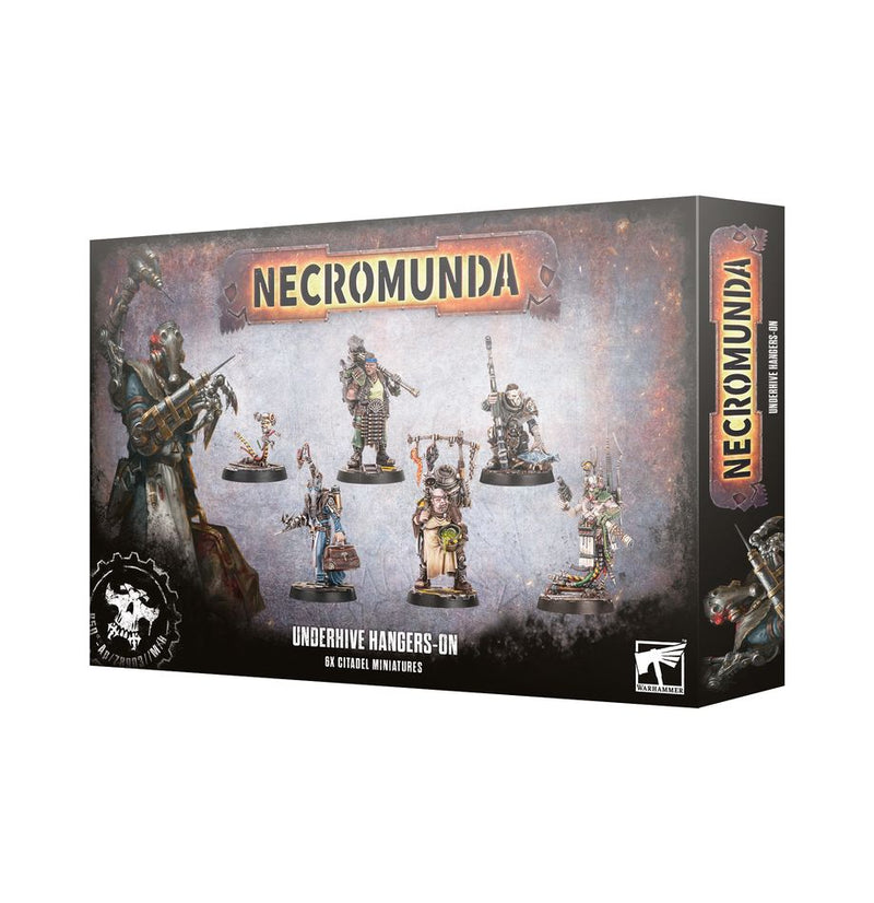 Box of Necromunda: Underhive Hangers-on containing six Games Workshop Necromunda miniatures, featuring images of assembled and painted figures on the front, plastic components inside, and prominent game branding and logos.