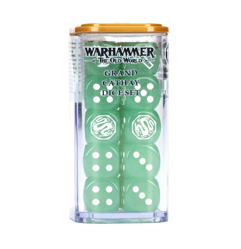 The Warhammer The Old World: Grand Cathay - Dice set has green dice with white pips in a clear box with gold lid; two have swirl designs.