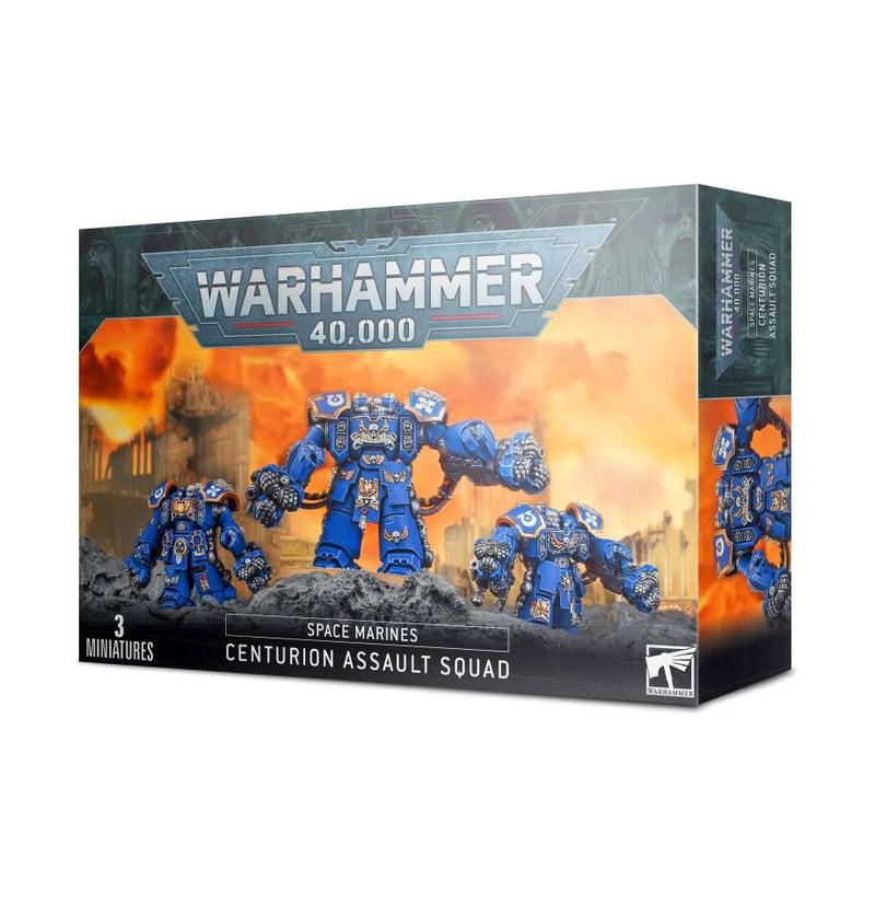 Box of Warhammer 40k: Space Marines Centurion Assault/Devastator Squad with three blue-armored miniatures on a fiery battlefield.