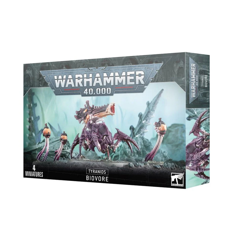 Box of Warhammer 40k Tyranids Biovore / Pyrovore miniatures, featuring an assembled and painted Biovore displayed with three smaller Tyranid models against a sci-fi background. Packaging shows text and logos.