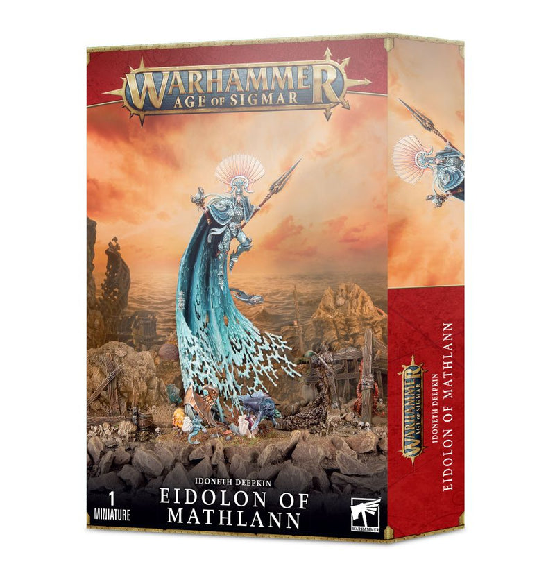 Boxed Warhammer Age of Sigmar: Idoneth Deepkin – Eidolon of Mathlann miniatures by Games Workshop, showcasing the Eidolon clad in blue armor and a flowing cloak, armed with a spear against a dramatic underwater-themed rocky backdrop.