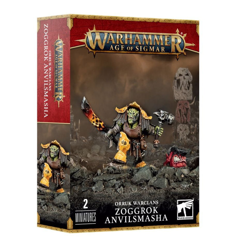 Warhammer Age of Sigmar: Orruk Warclans - Zoggrok Anvilsmasha features a detailed armored orc mini with a hammer, anvil, and squig on rocky terrain—ideal for your Citadel base from Games Workshop.