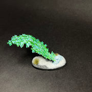 Used Warhammer AOS: Endless Spells - Emerald Lifeswarm. Miniature diorama with leafy green magical effect on snowy base. Out of Print.