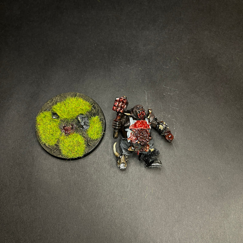 Painted and Based Metal Ogre Butcher.

Out of print.