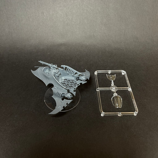 Assembled Drukhari Venom with Base.

As is.

Listing 4.