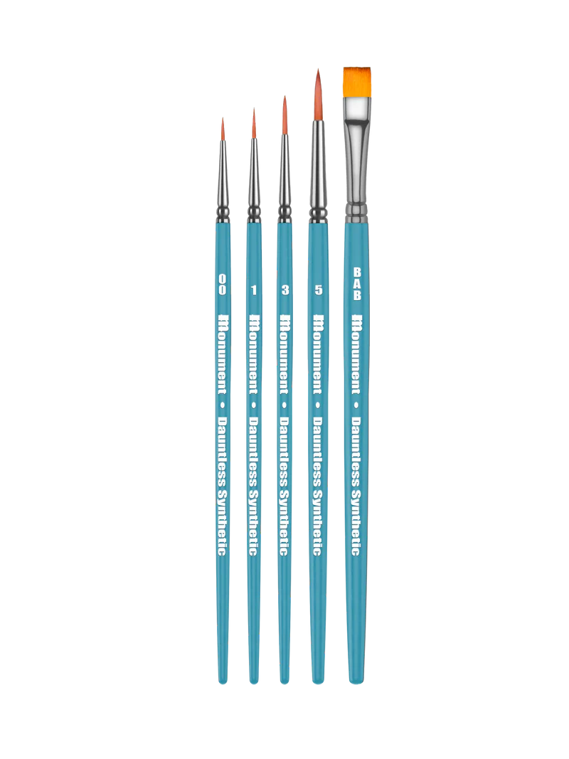 The Monument Hobbies Dauntless Synthetics Set of 5 features blue-handled brushes in assorted sizes and shapes on a white background.