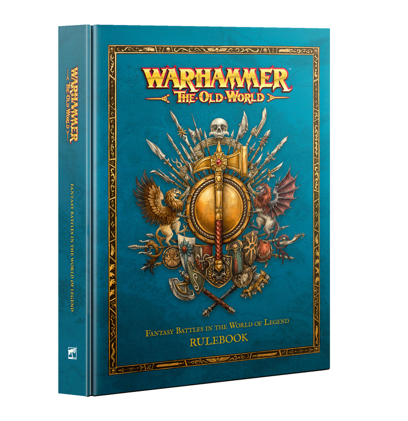 The image displays the Warhammer The Old World Rulebook, which has a teal cover with central shield, skull, weapons, and ornate gold designs.