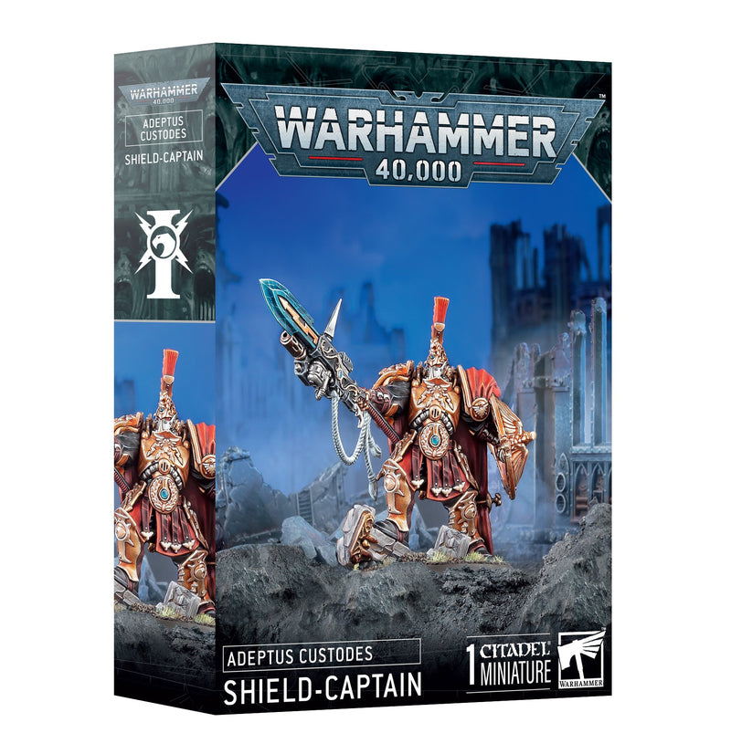 The Warhammer 40k: Adeptus Custodes - Shield Captain box has a gold-armored mini with shield, weapon, and product logos on packaging.