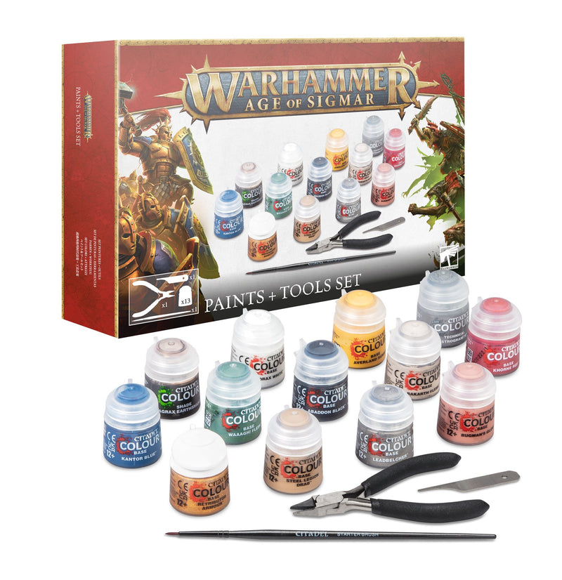 Warhammer Age of Sigmar: Paints + Tools set featuring 13 paint pots, a pair of clippers, a mold line remover, and a paintbrush—essential miniature painting tools from Games Workshop, pictured with the box in the background.