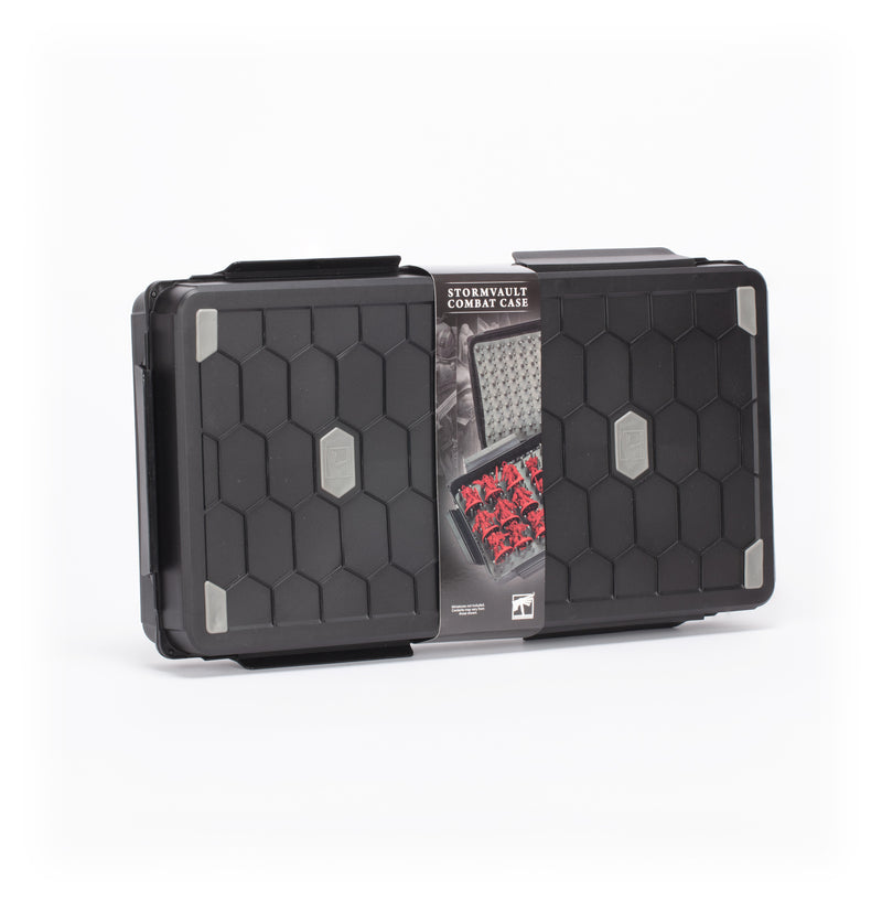 The Stormvault Combat Case is a black, rectangular miniature carrying case with a hex pattern, gray corners, and a label for foam-stored miniatures—ideal for transporting your Games Workshop models.