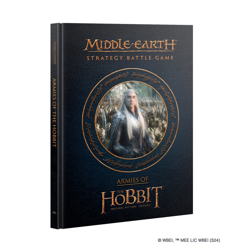 A book titled LOTR: Middle Earth Strategy Game: Armies of the Hobbit from Games Workshop, featuring an elf in armor on the cover surrounded by decorative gold script.