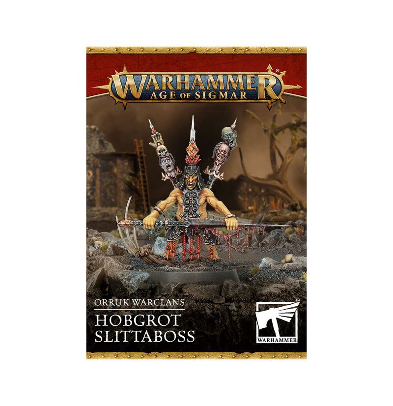 An unassembled miniature of the Hobgrot Slittaboss from Warhammer Age of Sigmar: Orruk Warclans, with weapons and skulls on spikes.