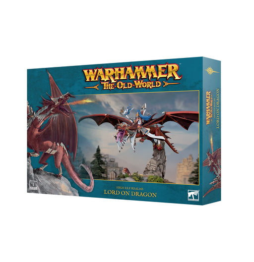 Warhammer The Old World: High Elf Realms – Lord on Dragon by Games Workshop features a detailed miniature of a warrior riding a red dragon above a rocky landscape with buildings in the background. This box set includes a Citadel base, perfect for display and painting.