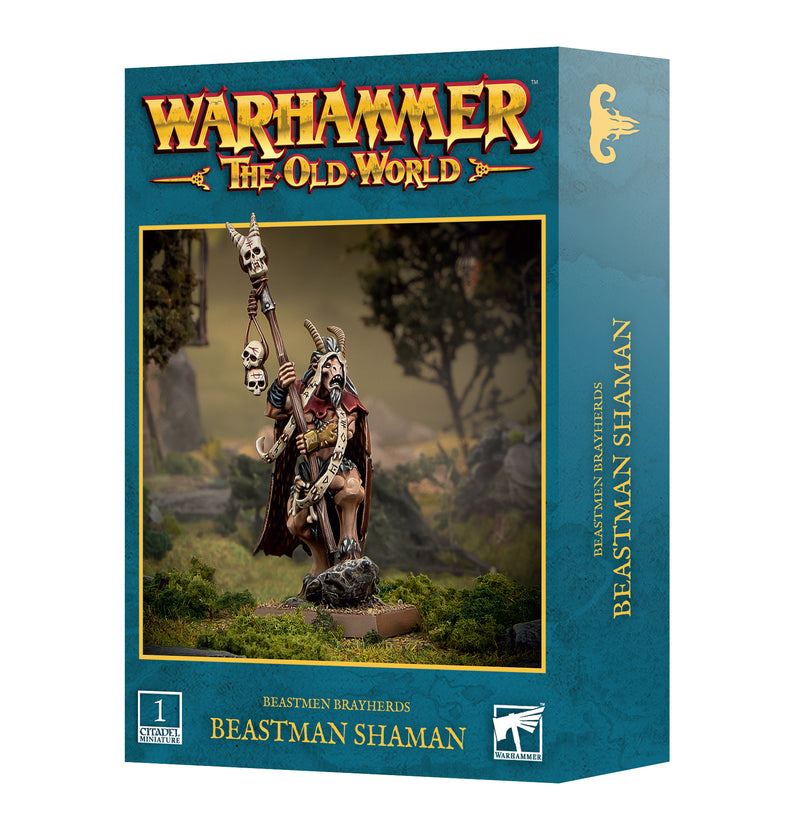 Box of Warhammer The Old World: Beastmen Brayherds - Beastman Shaman by Games Workshop, showcasing a painted Beastman Shaman miniature wielding a staff adorned with skulls, set against a woodland backdrop. The blue box features gold text and fantasy motifs, making it ideal for hobbyists interested in assembling miniatures and painting them with Citadel Base paints.