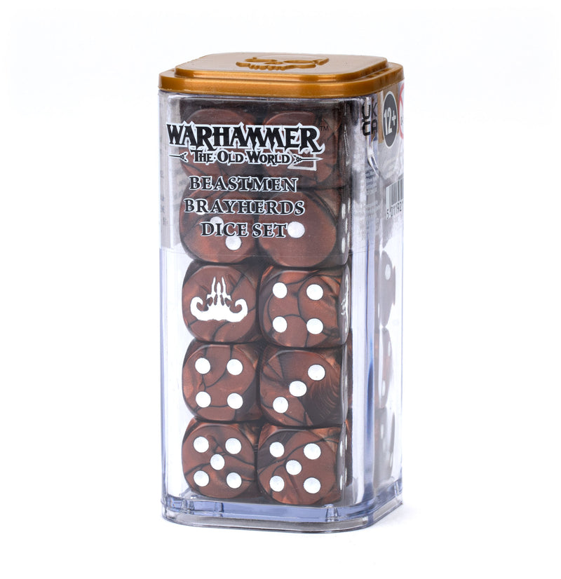 A clear plastic case with a gold lid holds Warhammer The Old World: Beastmen Brayherds Dice—brown with white dots and a unique symbol.
