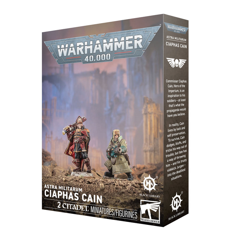 Warhammer 40k: Astra Militarum - Caiphas Cain box showcases two painted miniatures posed before a sci-fi cityscape, with product branding and text on the packaging.