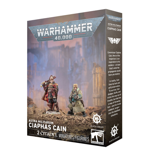 Warhammer 40k: Astra Militarum - Caiphas Cain box showcases two painted miniatures posed before a sci-fi cityscape, with product branding and text on the packaging.