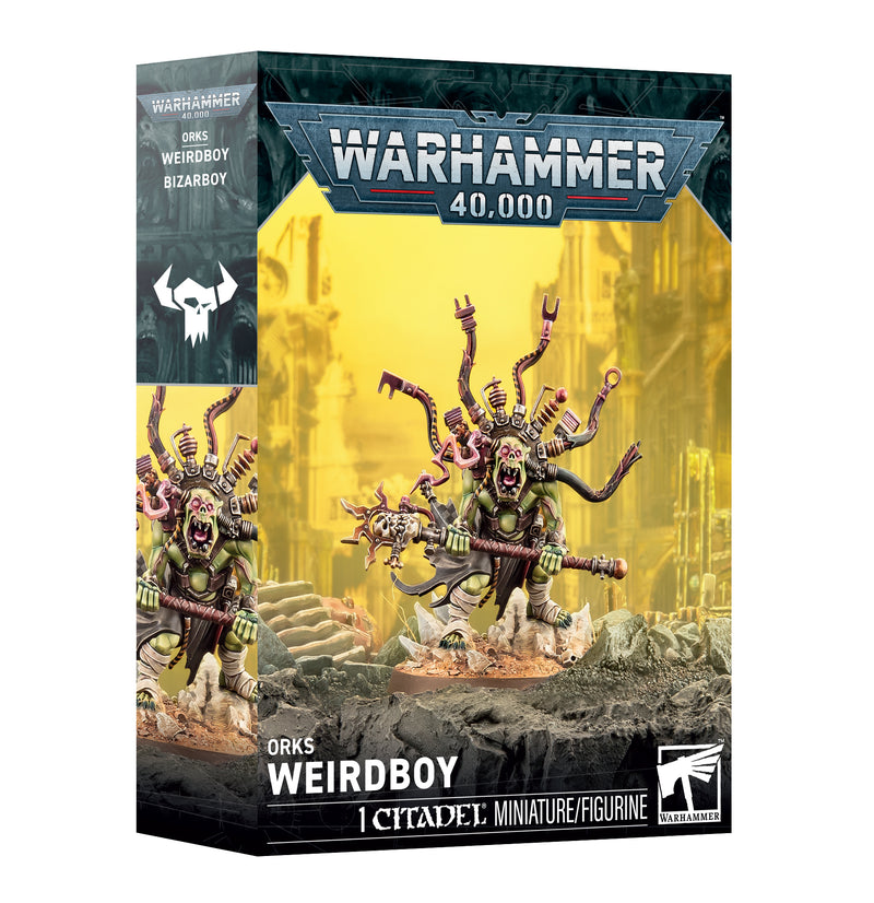 Warhammer 40k: Orks - Weirdboy by Games Workshop, featuring a painted, multi-limbed Ork miniature with tubes and a staff, set against a yellow industrial background on packaging with Warhammer branding.