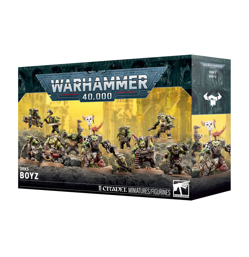 Box of Warhammer 40k: Orks - Boyz miniatures featuring painted Ork figures in dynamic battle poses set against a fortress backdrop, with text displaying the product name and official branding.