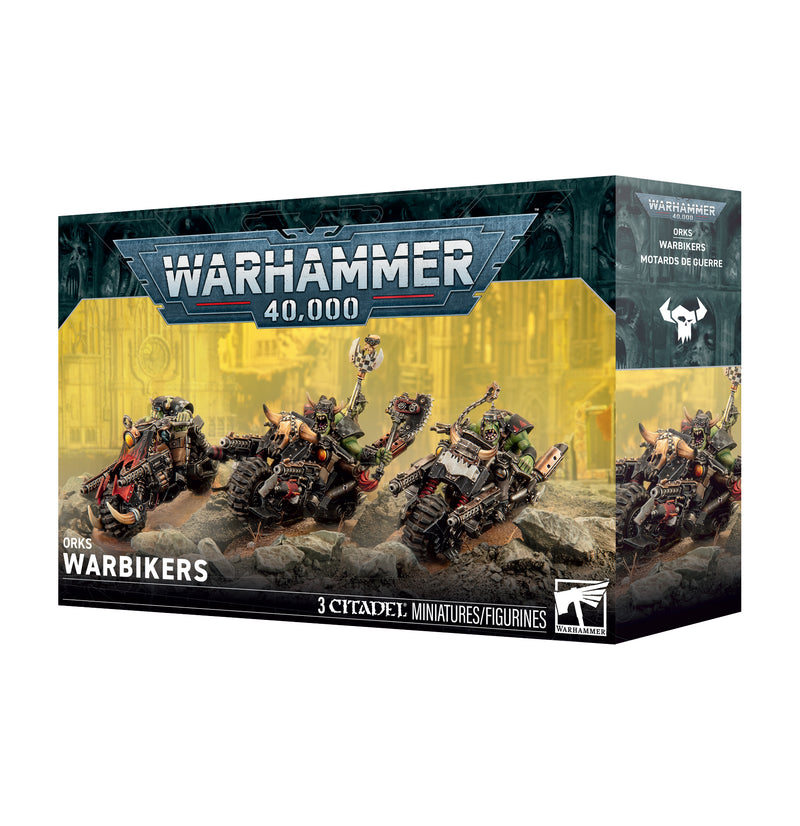 Warhammer 40k: Orks - Warbikers box from Games Workshop, featuring three painted Ork miniatures riding bikes against a rugged terrain background, with official branding and box contents displayed.