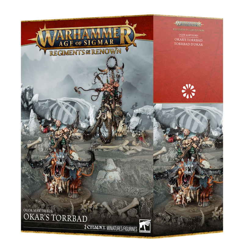 Box of Warhammer Age of Sigmar: Ogor Mawtribes - Regiment of Renown: Okar’s Torrbad miniatures, featuring a painted Huskard on Stonehorn riding a beast, depicted with snowy terrain and additional figures on Games Workshop packaging.