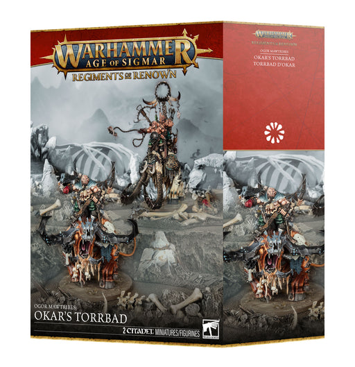 Box of Warhammer Age of Sigmar: Ogor Mawtribes - Regiment of Renown: Okar’s Torrbad miniatures, featuring a painted Huskard on Stonehorn riding a beast, depicted with snowy terrain and additional figures on Games Workshop packaging.