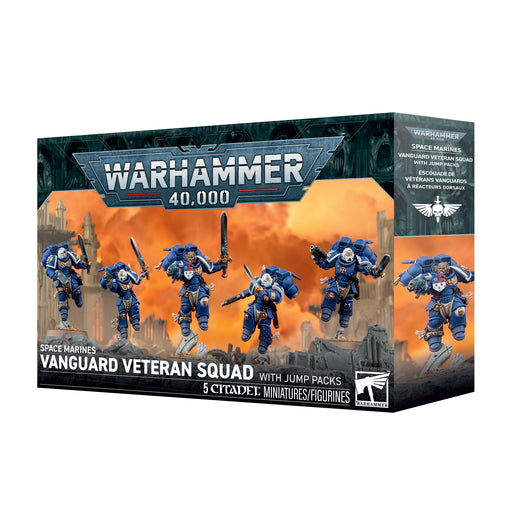 Warhammer 40k: Space Marines - Vanguard Veteran Squad with Jump Packs box set, showcasing five blue-armored miniatures equipped with jump packs set against a ruined city backdrop.