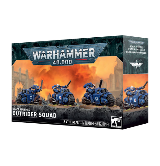 The Warhammer 40k: Space Marines - Outrider Squad box from Games Workshop features three blue-armored Space Marine bikers, each equipped with weapons and depicted in an intense, fiery battle scene. The packaging clearly displays the brand and product information.