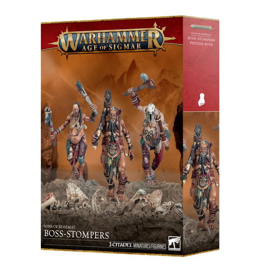Warhammer Age of Sigmar: Sons of Behemat - Boss-Stompers includes three finely detailed ogre miniatures equipped with weapons, set in a rocky environment. The packaging features Games Workshop branding and comprehensive product information.